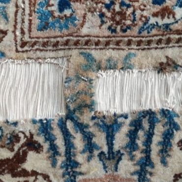 Fasi del restauro tappeto Nain