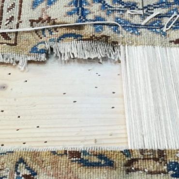 Fasi del restauro tappeto Nain