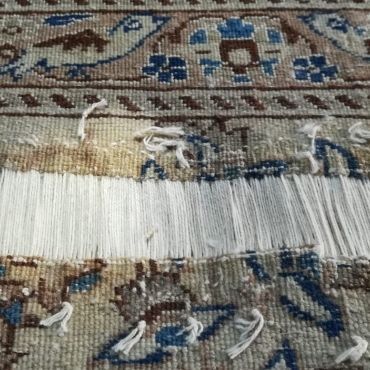 Fasi del restauro tappeto Nain