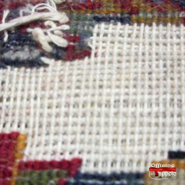 Completamento della tramatura di un tappeto Kashan